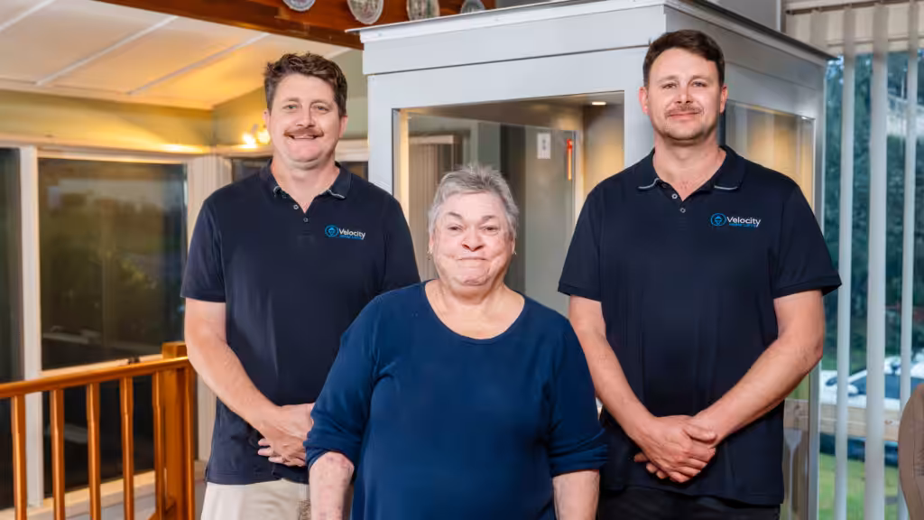 Velocity Home Lifts expert smiling with client Lynn